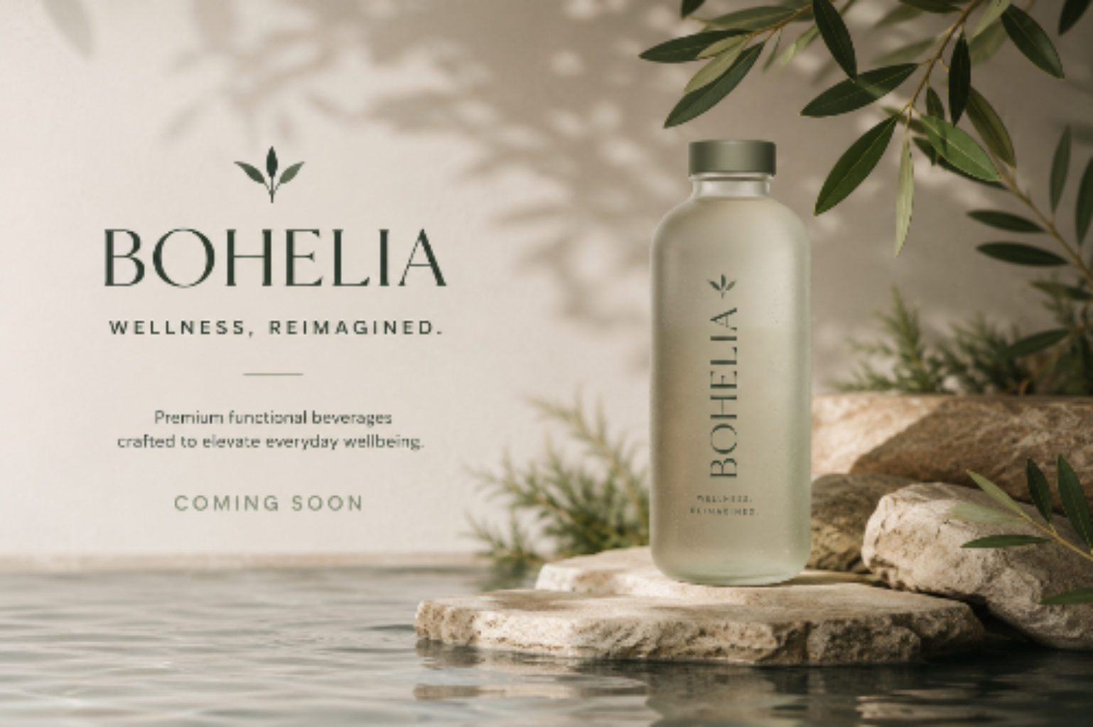 A frosted glass water bottle labeled BOHELIA stands on a stone slab in a natural setting with water, rocks, and green leaves. Text on the left reads 'BOHELIA WELLNESS, REIMAGINED.